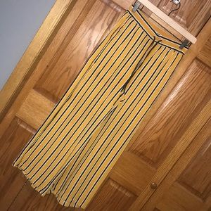 Black and yellow striped wide leg trousers